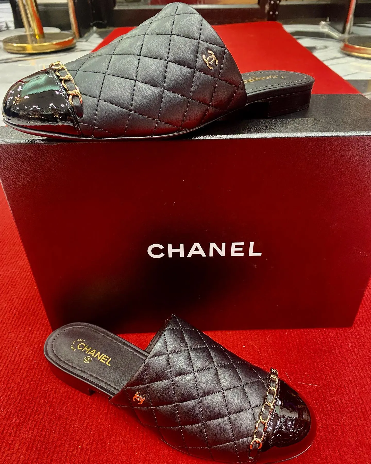 CHANEL LAMBSKIN QUILTED CHAIN MULES