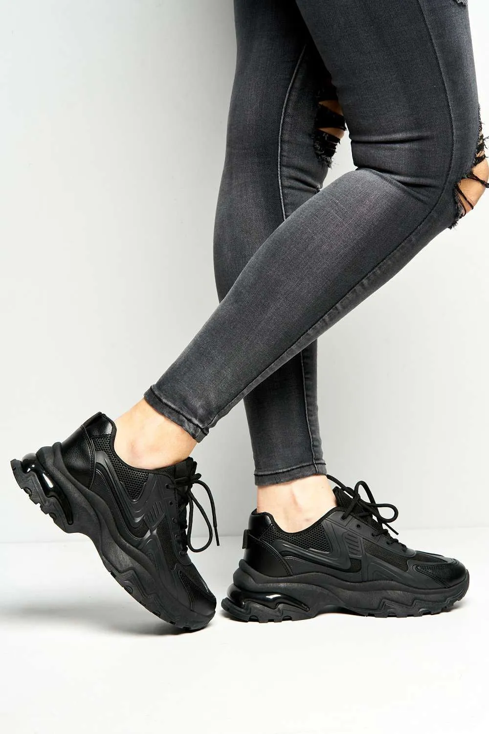 Yug Chunky Sole Lace-Up Trainers in Black